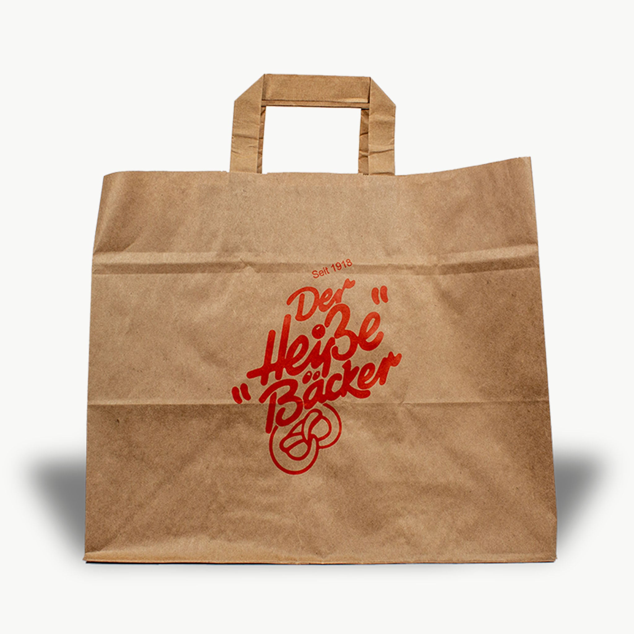 Braune Papiertragetasche mit Flachhenkel und individuellem Logo-Druck