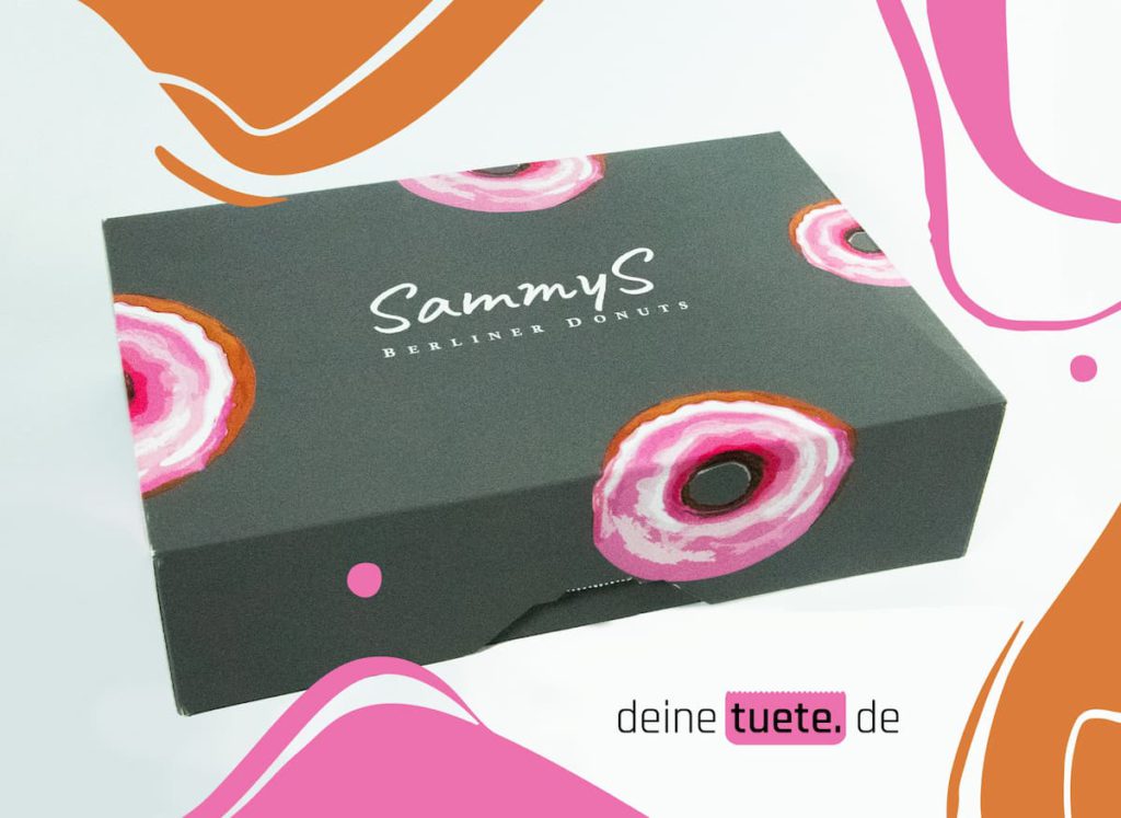 Individuell bedruckte Donutbox von Sammys Donuts aus Berlin. Ein schlichtes, aber dennoch ansprechendes Verpackungsdesign.